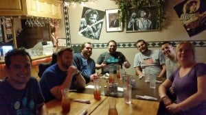 The team relaxing with cold brews after job well done